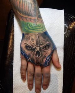 hand-hollis-cantrell-iconic-tattoo-ink-piercing-gamer-tattoo